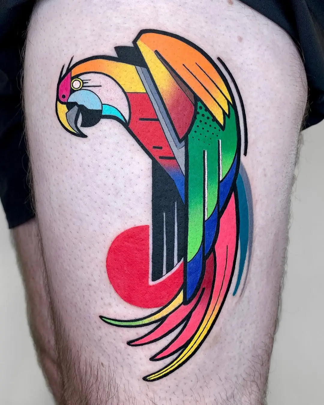 Vibrantly stylized parrot tattoo for nature lovers