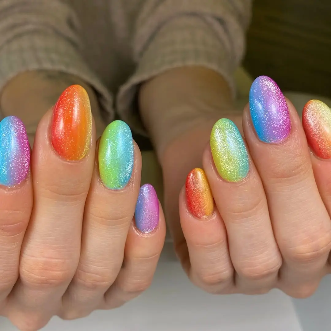 Vibrant multi-colored rainbow nail design