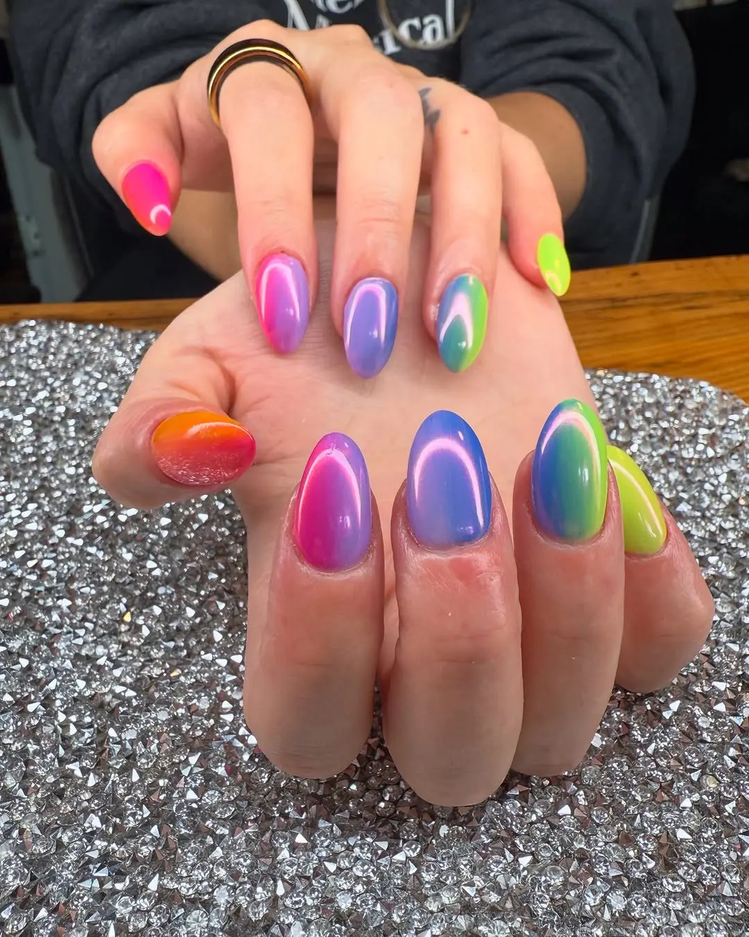 Playful rainbow nails with vibrant hues