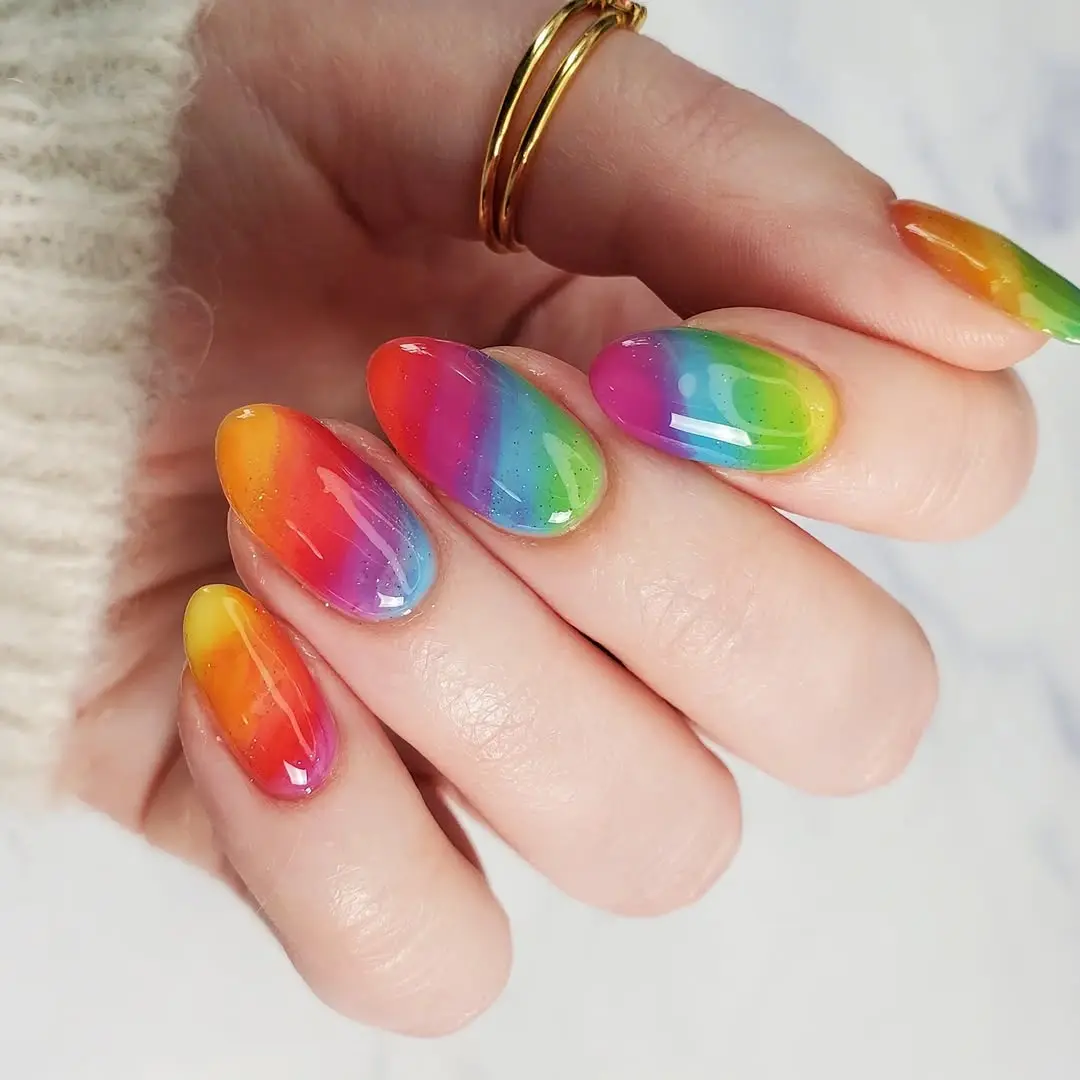 Bright and vibrant rainbow nail design