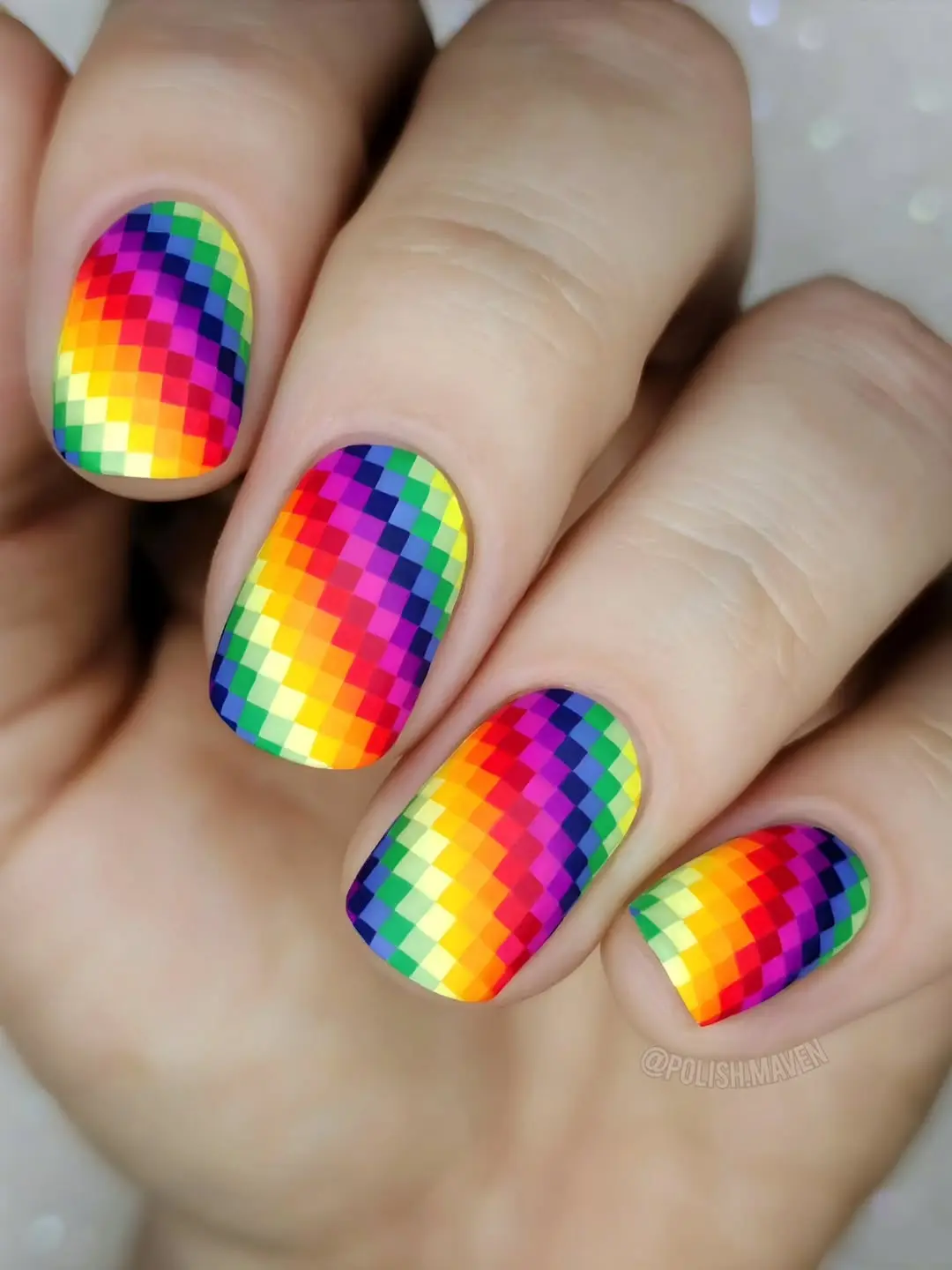 Vivid Pixelated Rainbow Nail Art Display