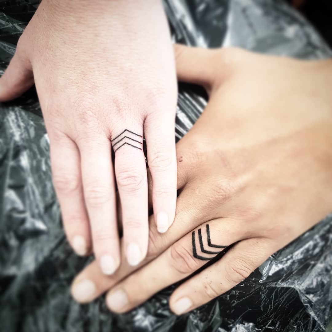Stylish minimalist wedding ring tattoo designs