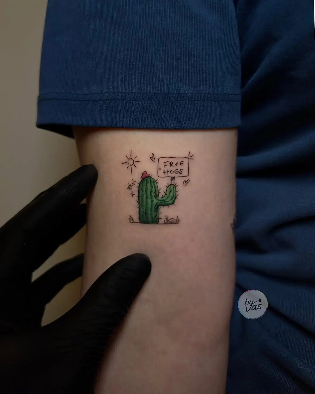 Cute cactus tattoo offering free hugs