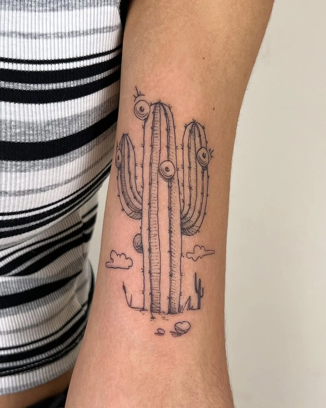 Unique cactus tattoo with a playful twist