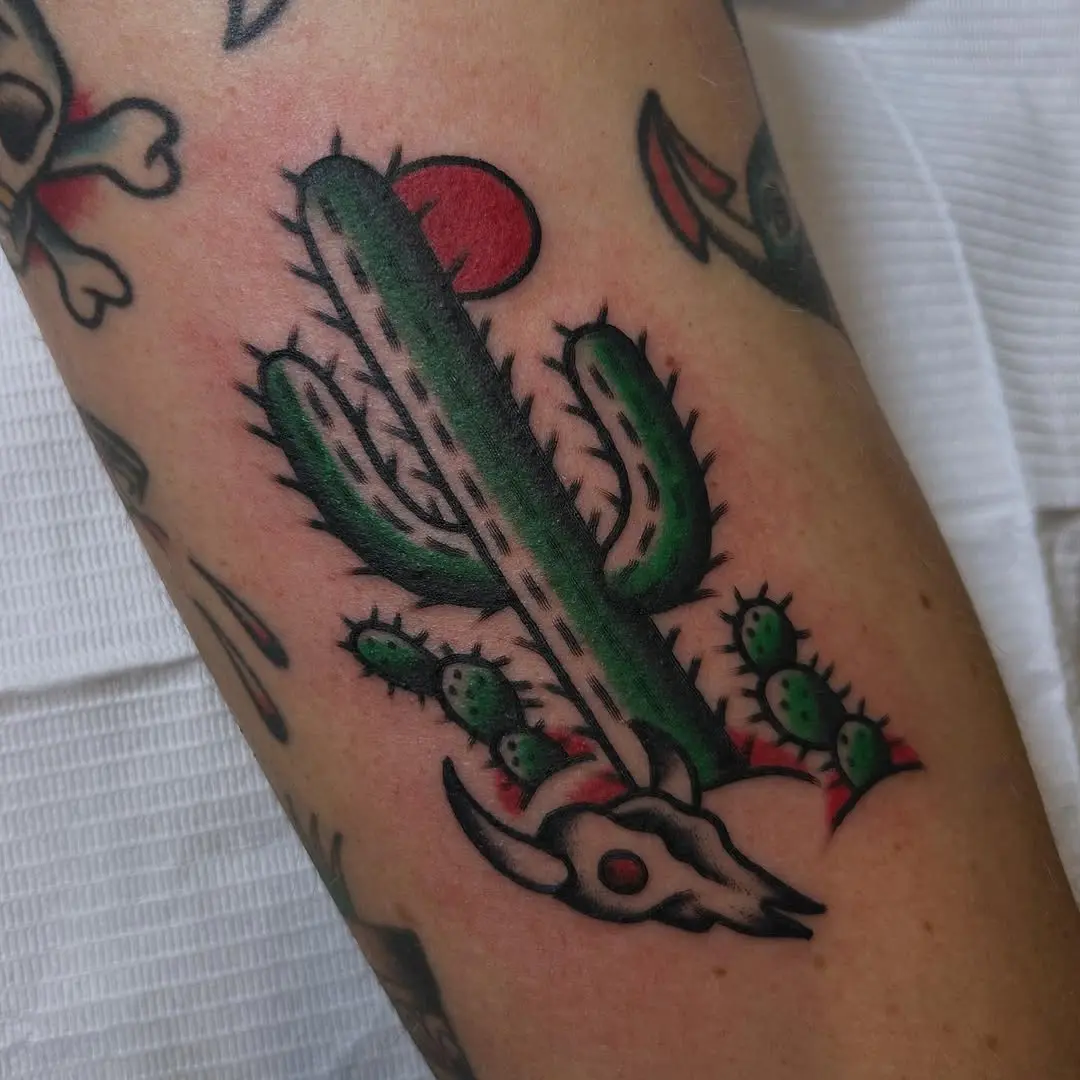 Vibrant cactus tattoo with skull elements