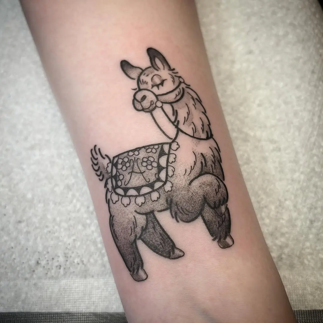 Adorable cartoon llama tattoo with playful vibes