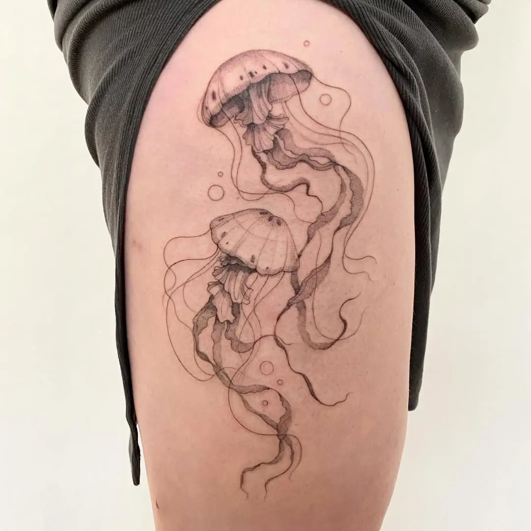Stunning jellyfish tattoo with intricate details