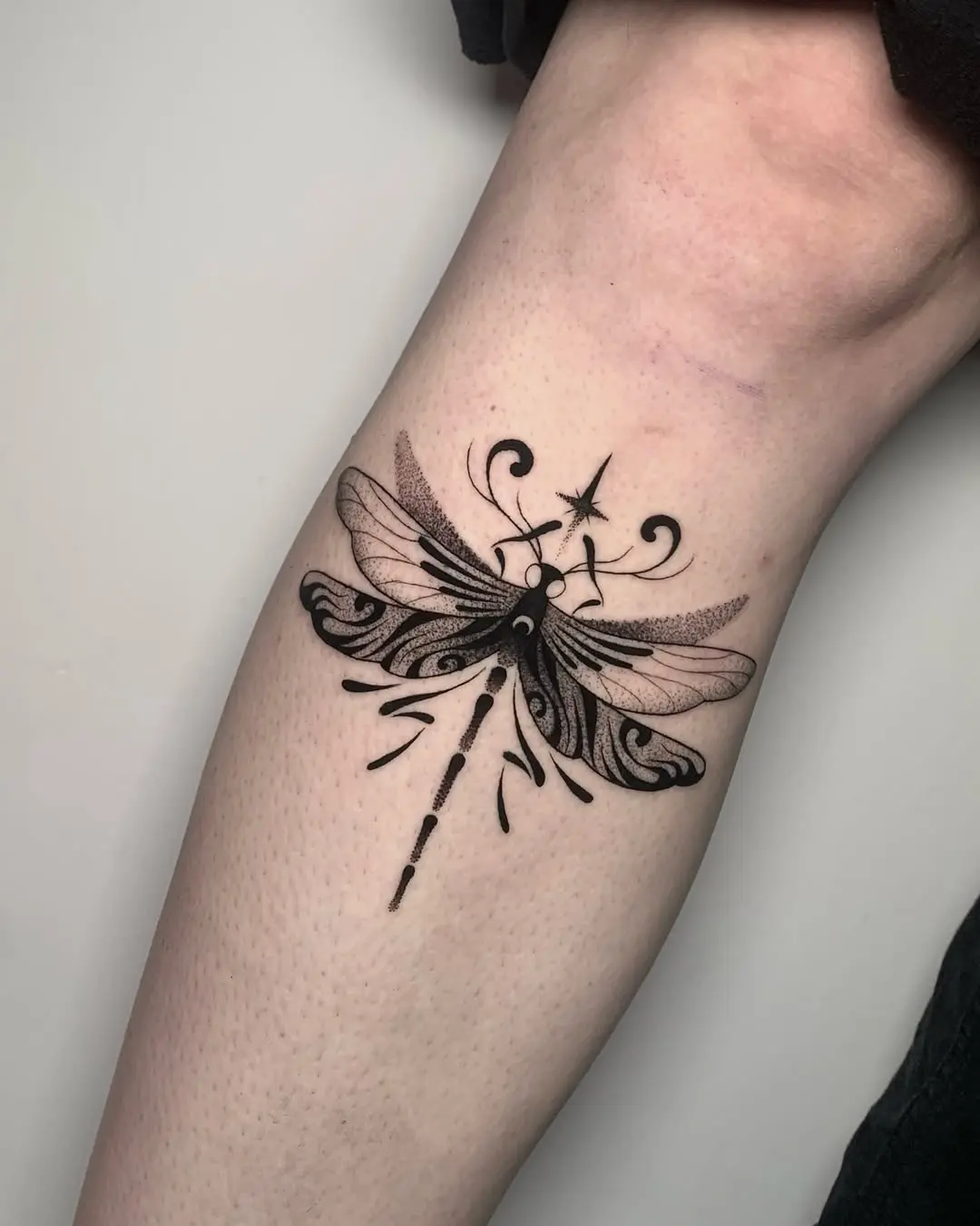 Stunning Firefly Tattoo with Intricate Detailing
