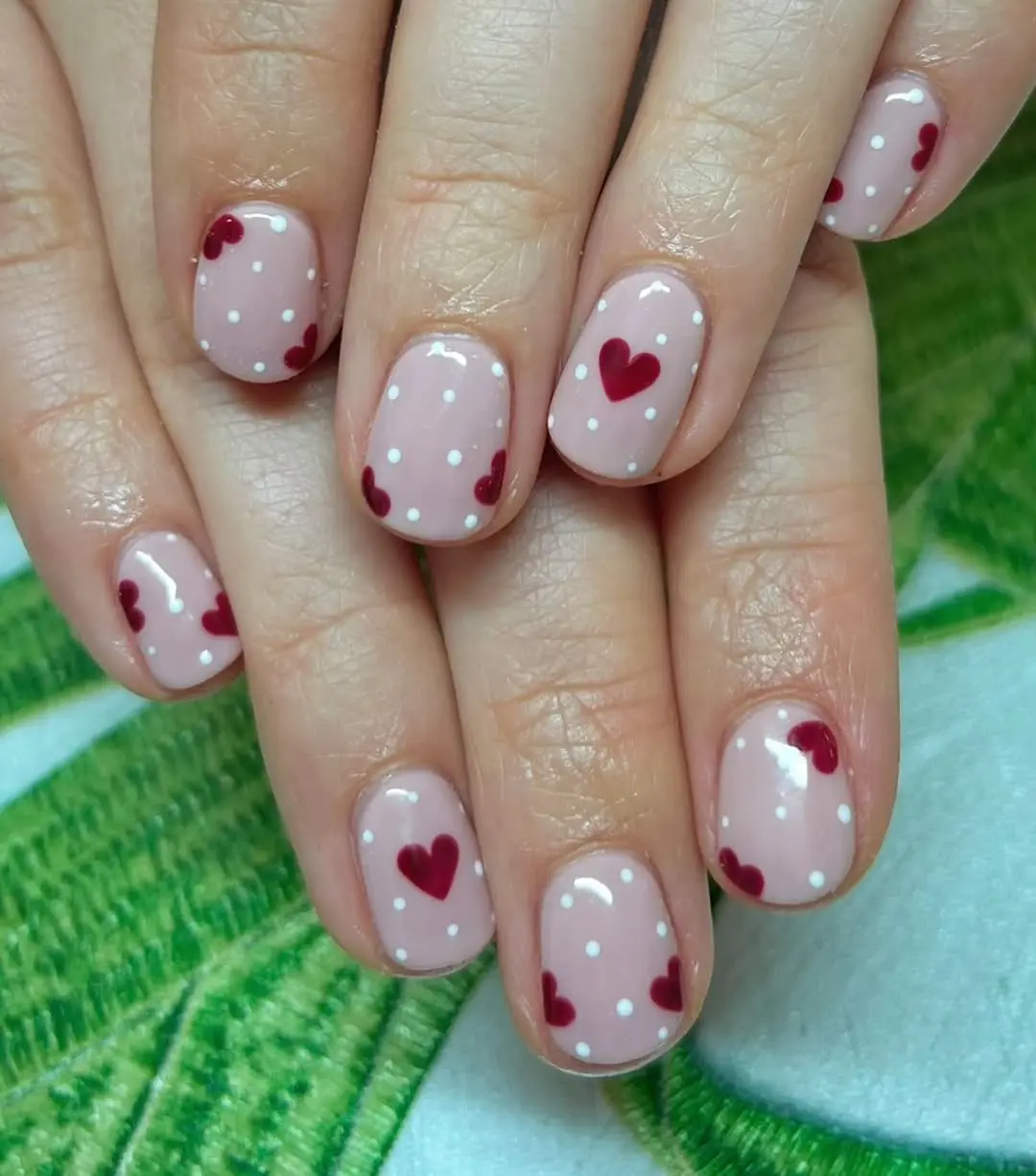 Charming heart nails with playful polka dots