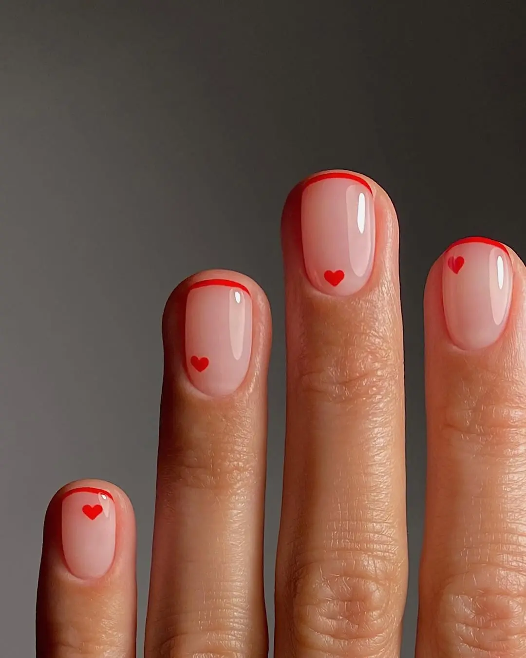 Charming heart-tipped nails for a playful touch