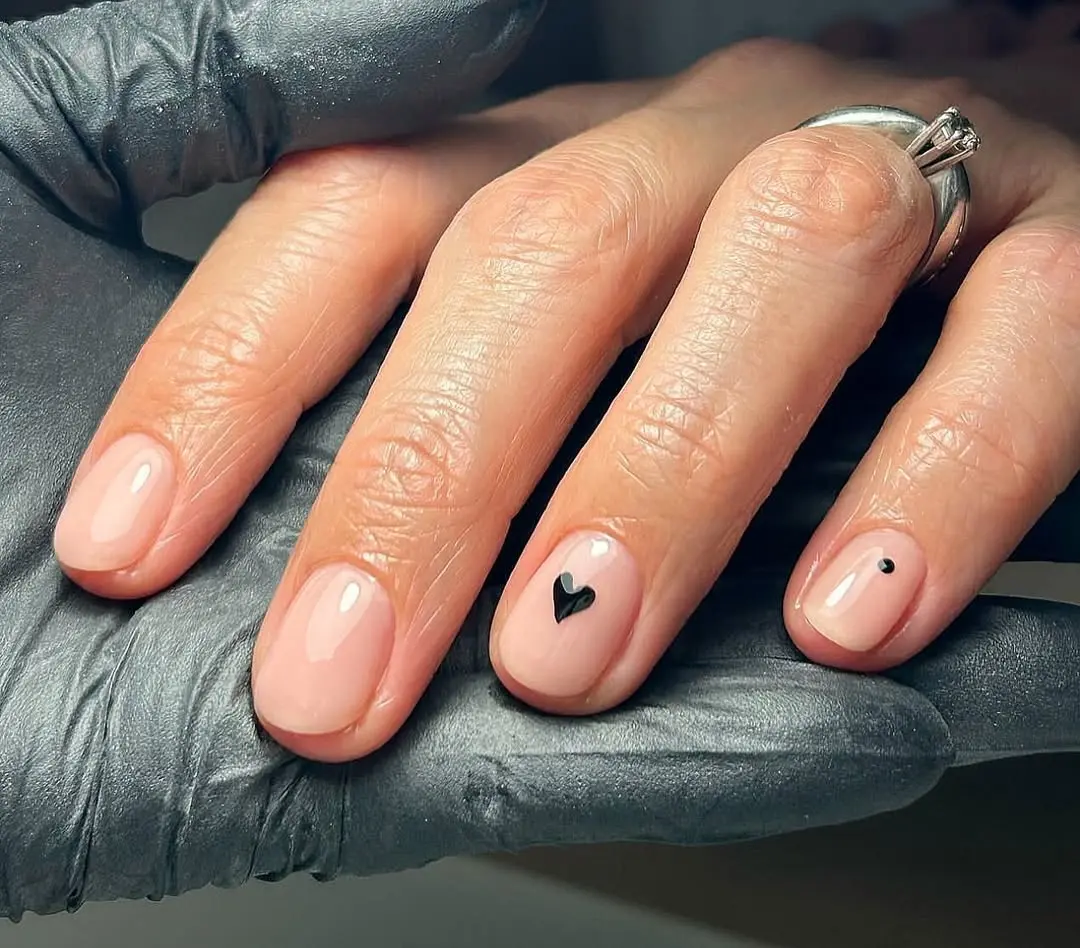 Chic heart accents on glossy nails