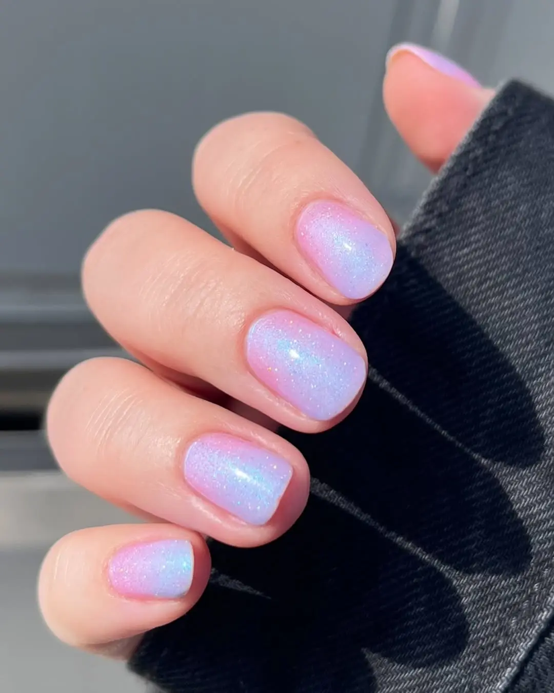 Iridescent pastel sparkly nails for a dreamy look