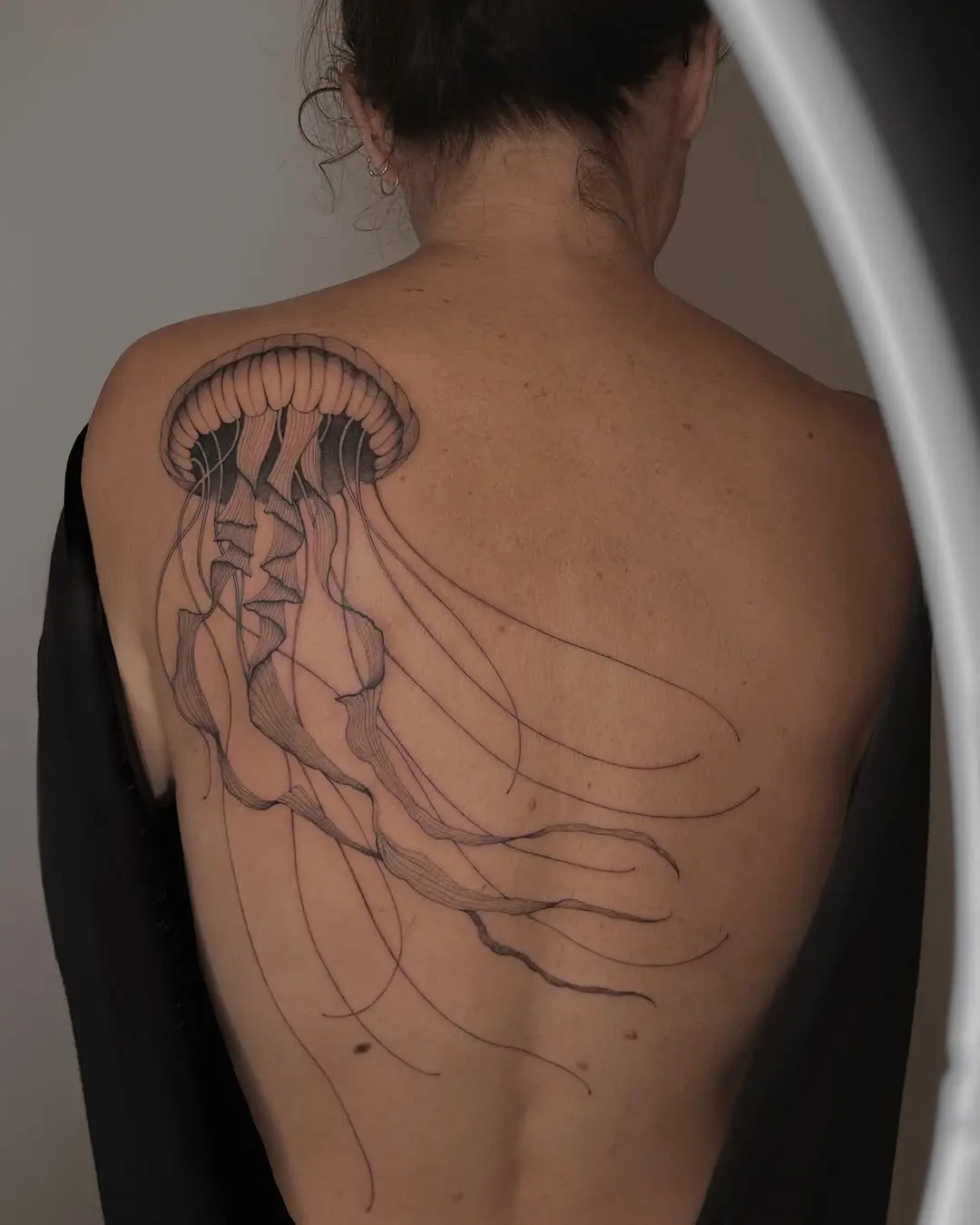 Elegant Jellyfish Tattoo on the Back