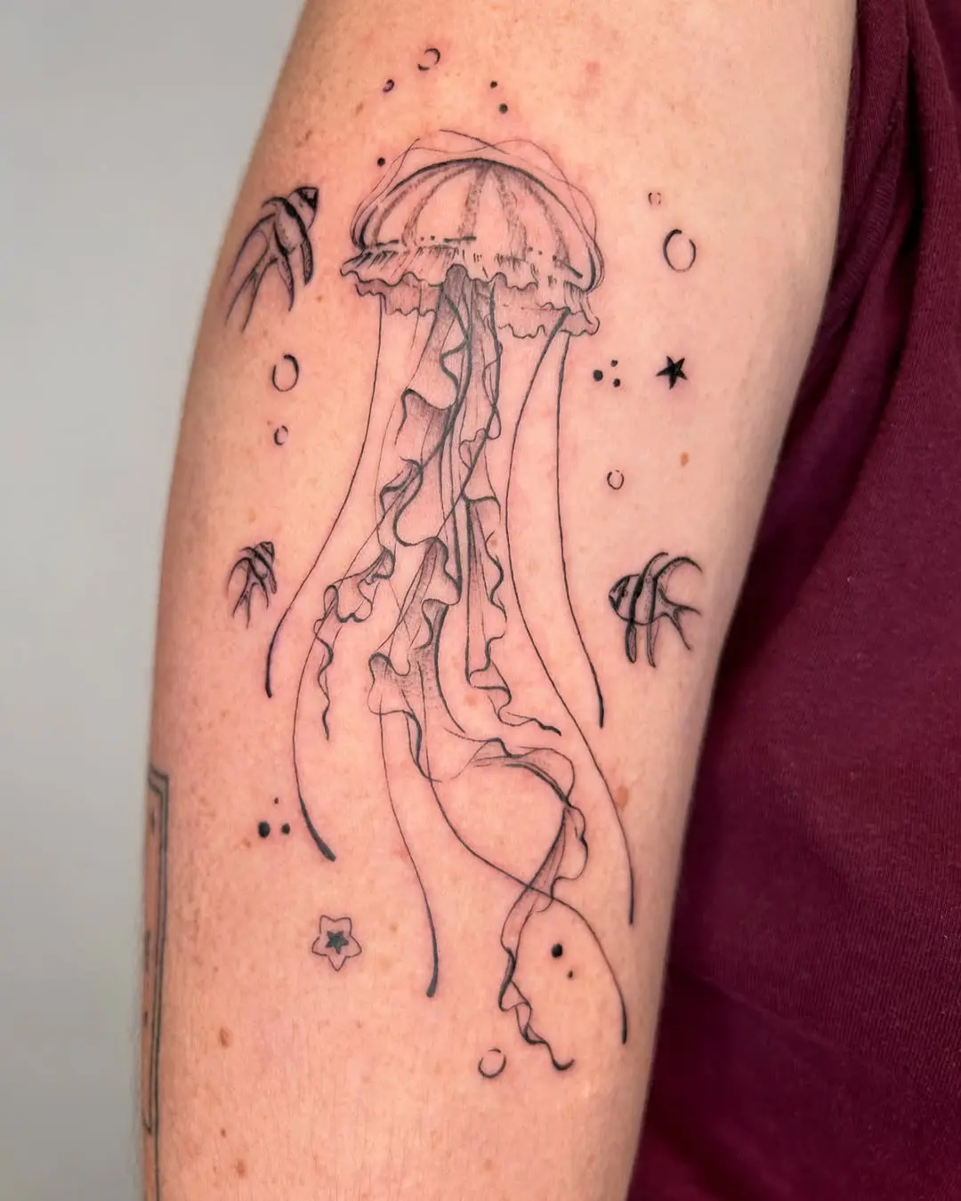 Elegant jellyfish tattoo with flowing tentacles