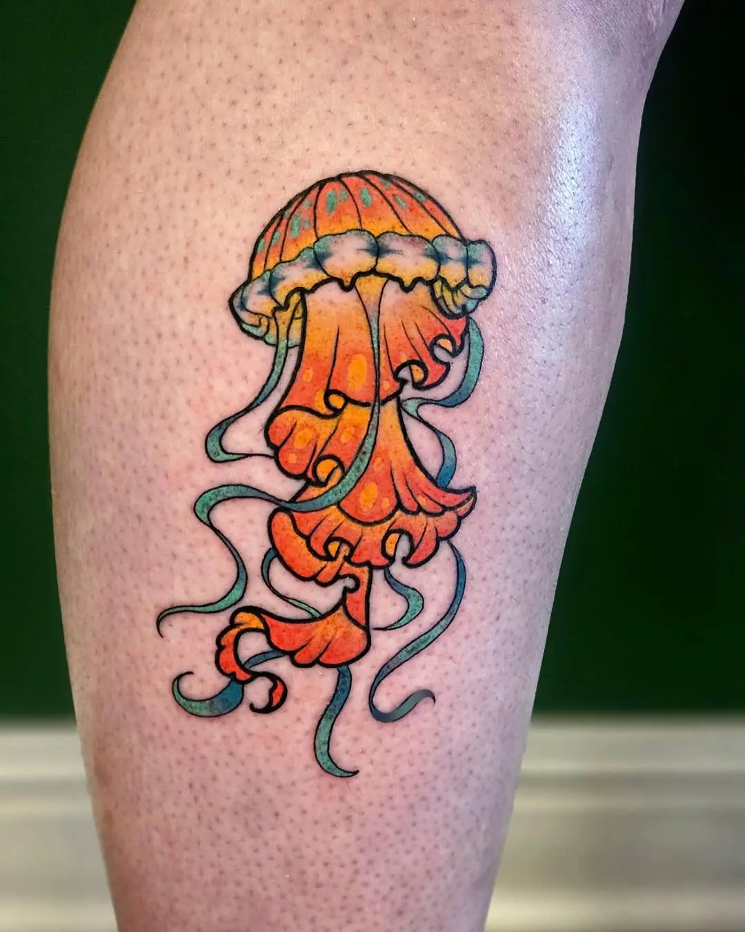 Whimsical Jellyfish Tattoo in Bright Colors