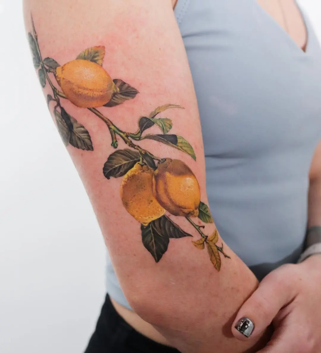 Vibrant and Lively Lemon Tattoo Design