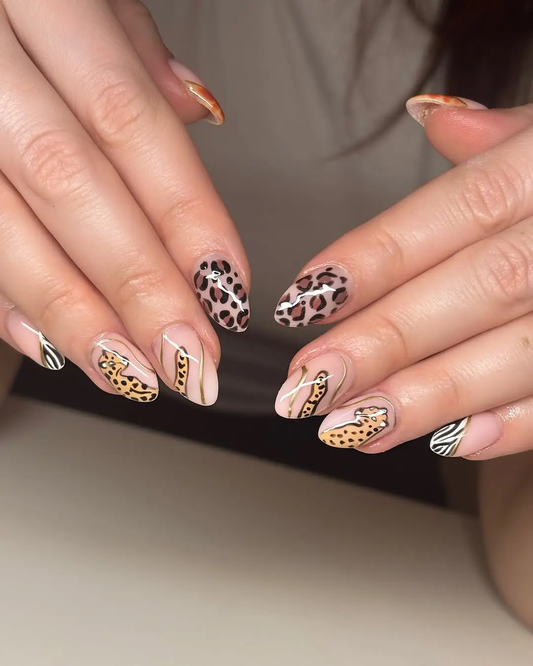 Stylish leopard print nails with chic accents