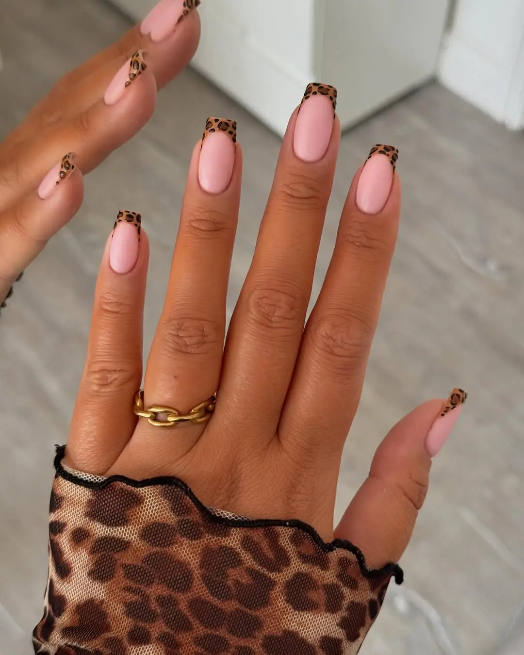 Stylish leopard print with subtle pink base