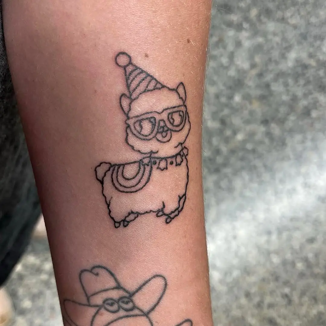 Adorable llama tattoo with playful vibe