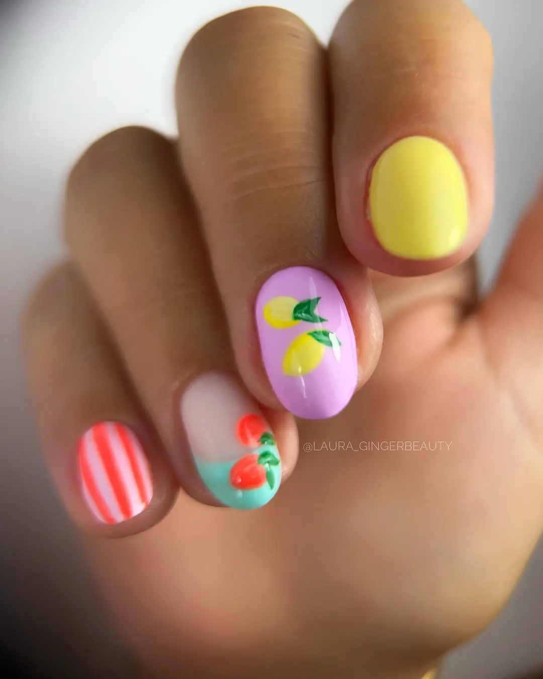 Colorful summer fruit-themed nails with stripes