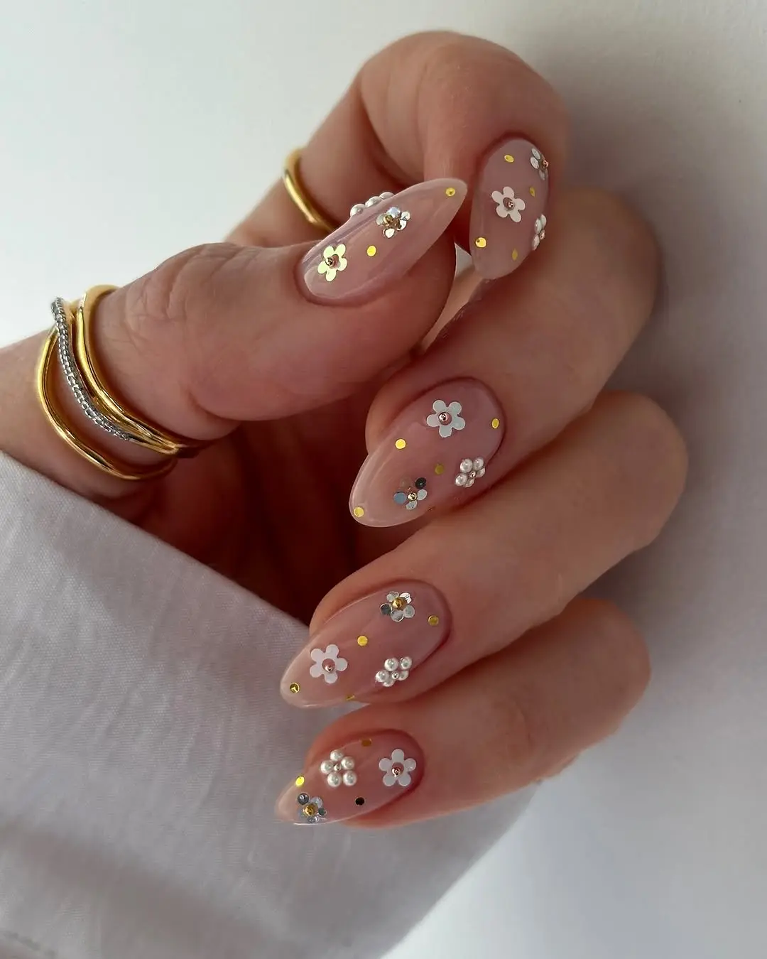 Chic floral nails with sparkling accents