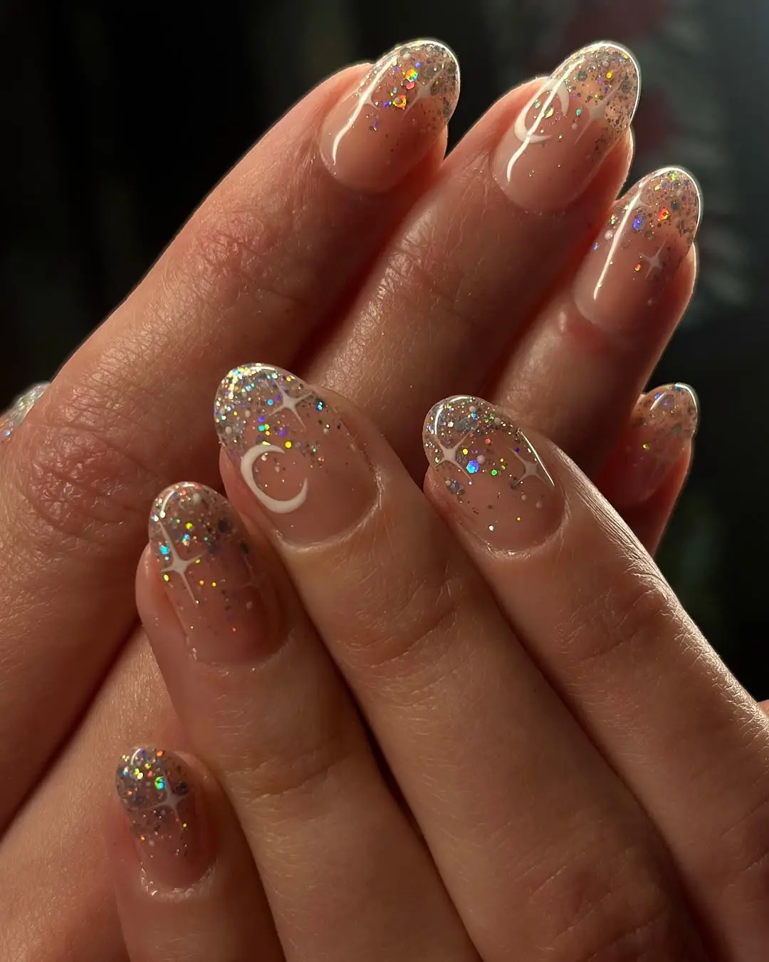 Dazzling glitter accents on elegant nude nails