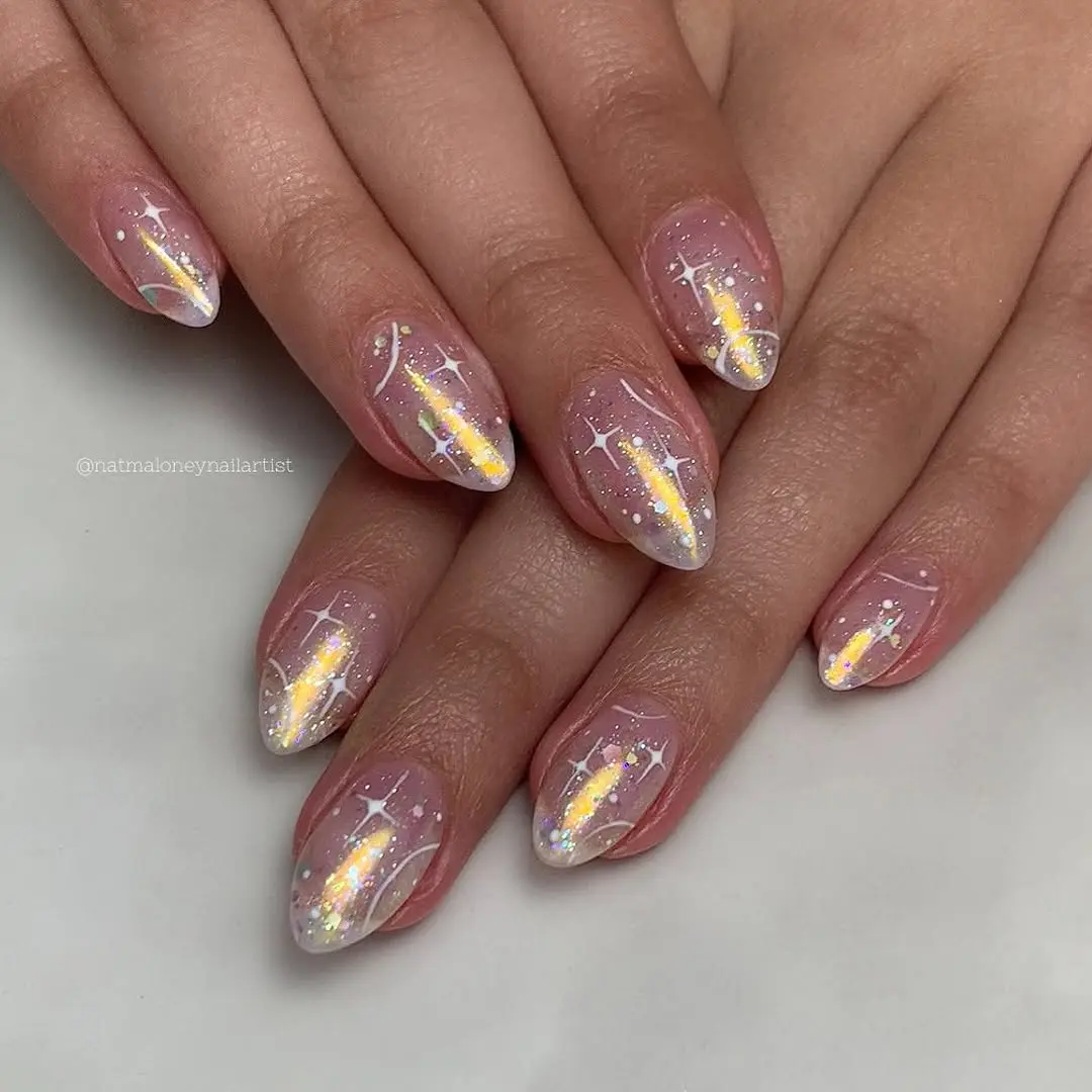 Glimmering stiletto nails with ethereal sparkle