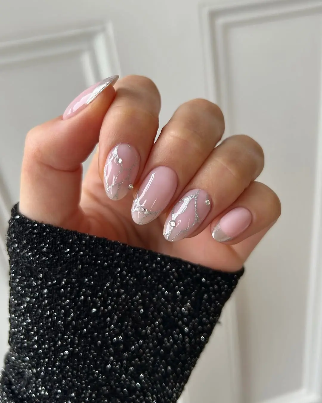 Chic sparkly pink nails with silver accents