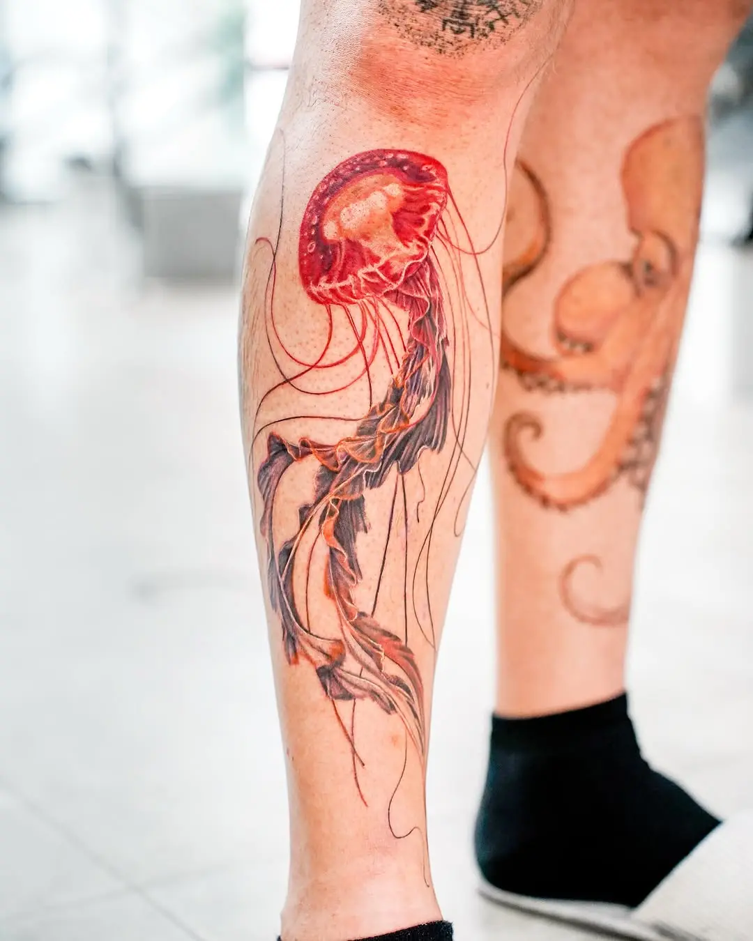 Stunning jellyfish tattoo showcasing vibrant colors