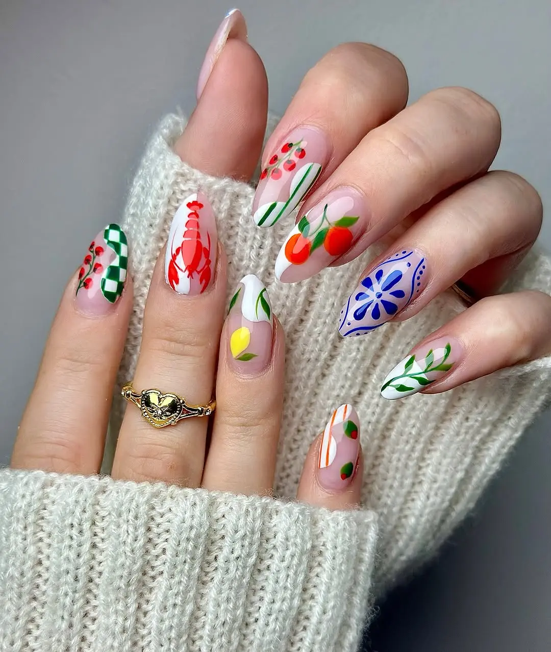 Vivid summer-inspired fruit and flower nail art