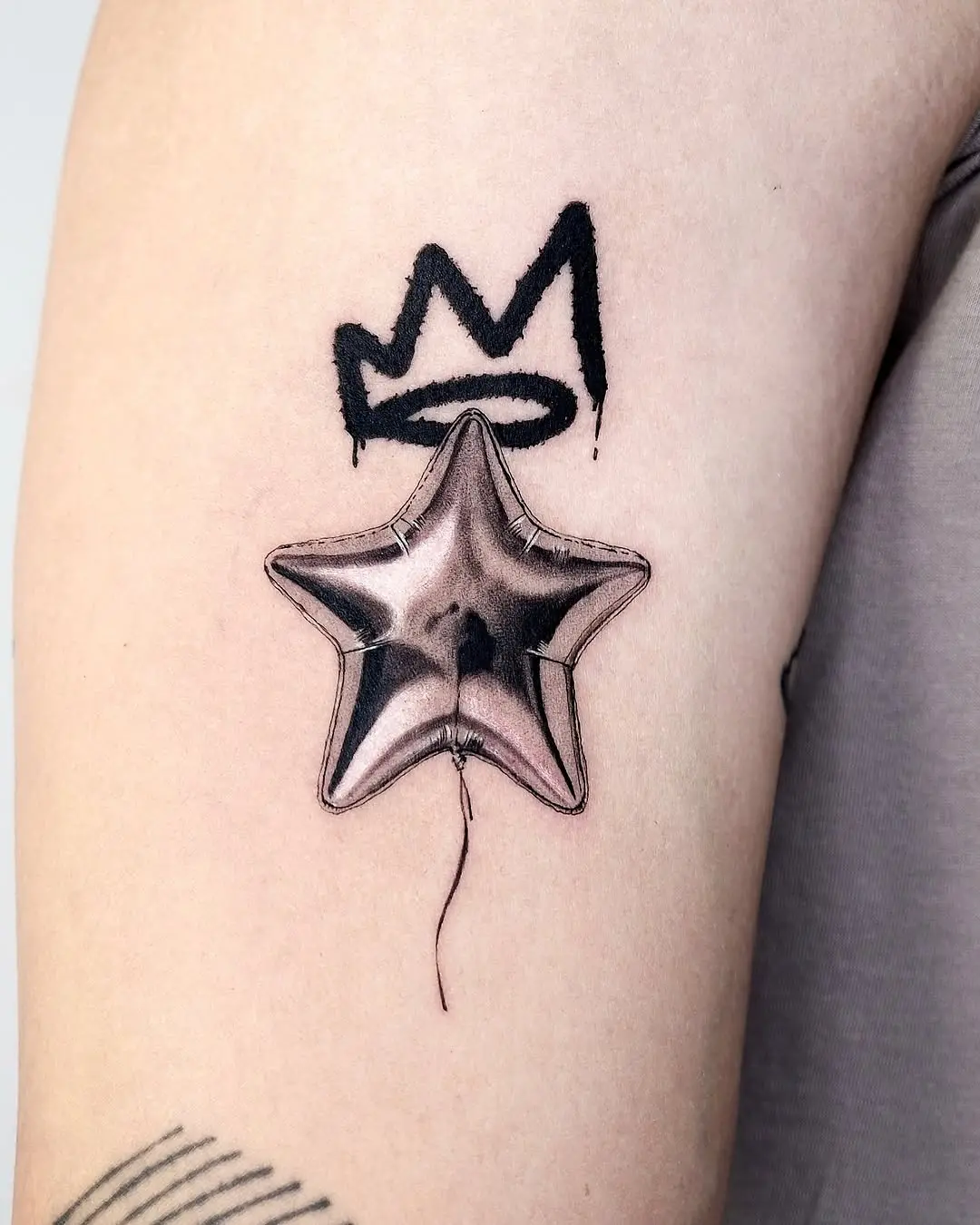 Unique 3D balloon star tattoo inspiration
