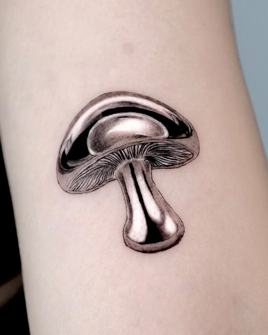 Realistic 3D mushroom tattoo art
