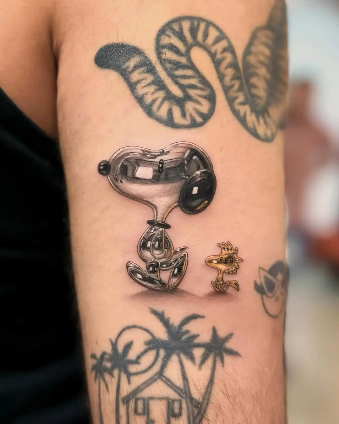 Playful 3D Snoopy and Woodstock tattoo design.