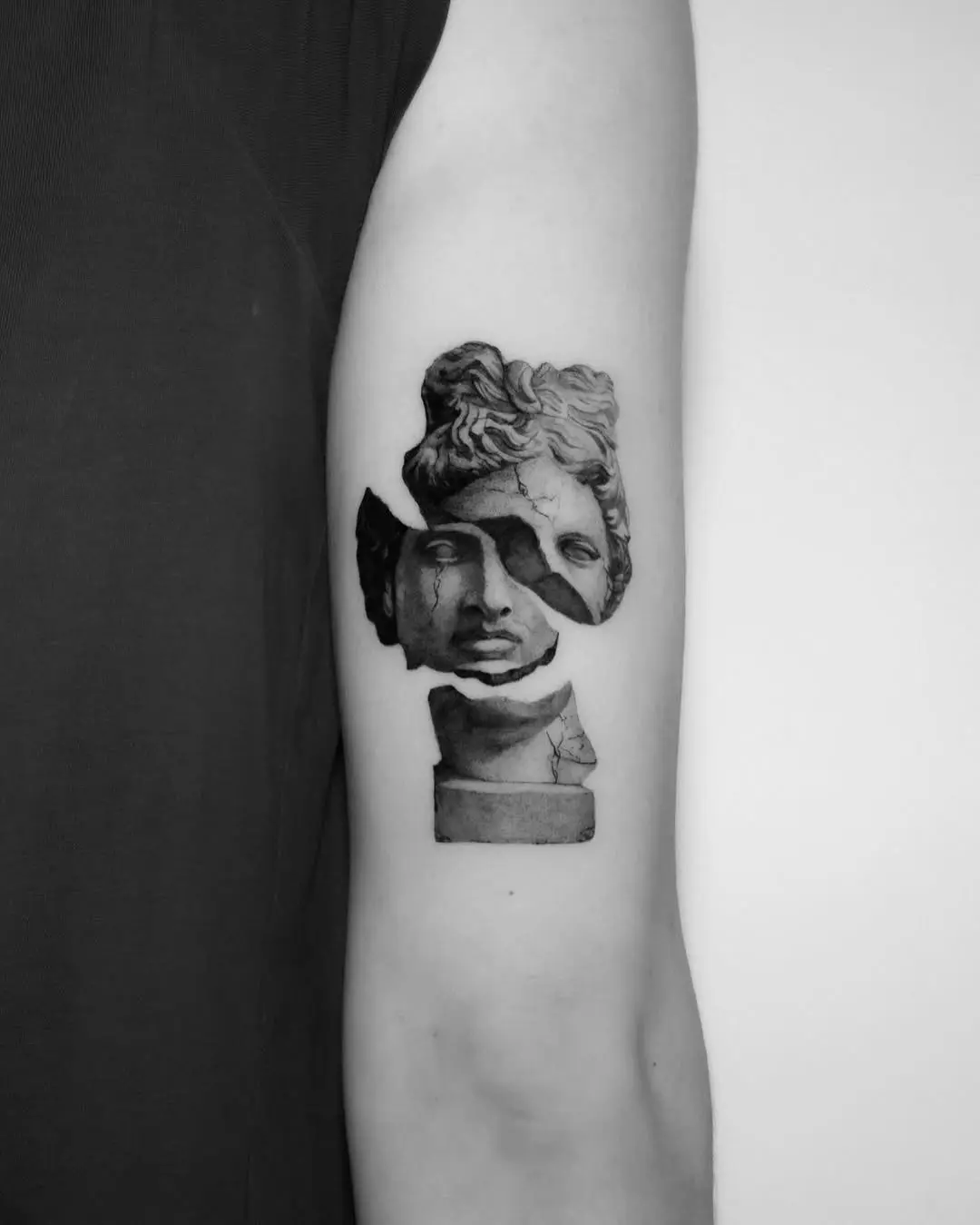 Stunning 3D shattered statue tattoo design