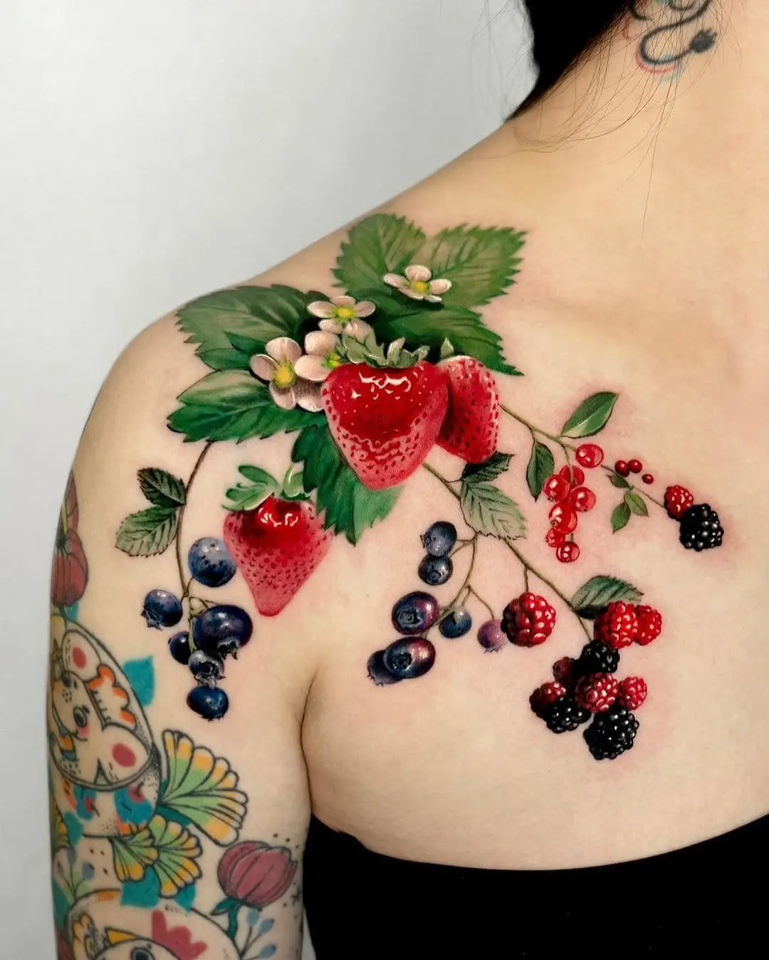 Vivid 3D Strawberry and Berry Tattoo Design
