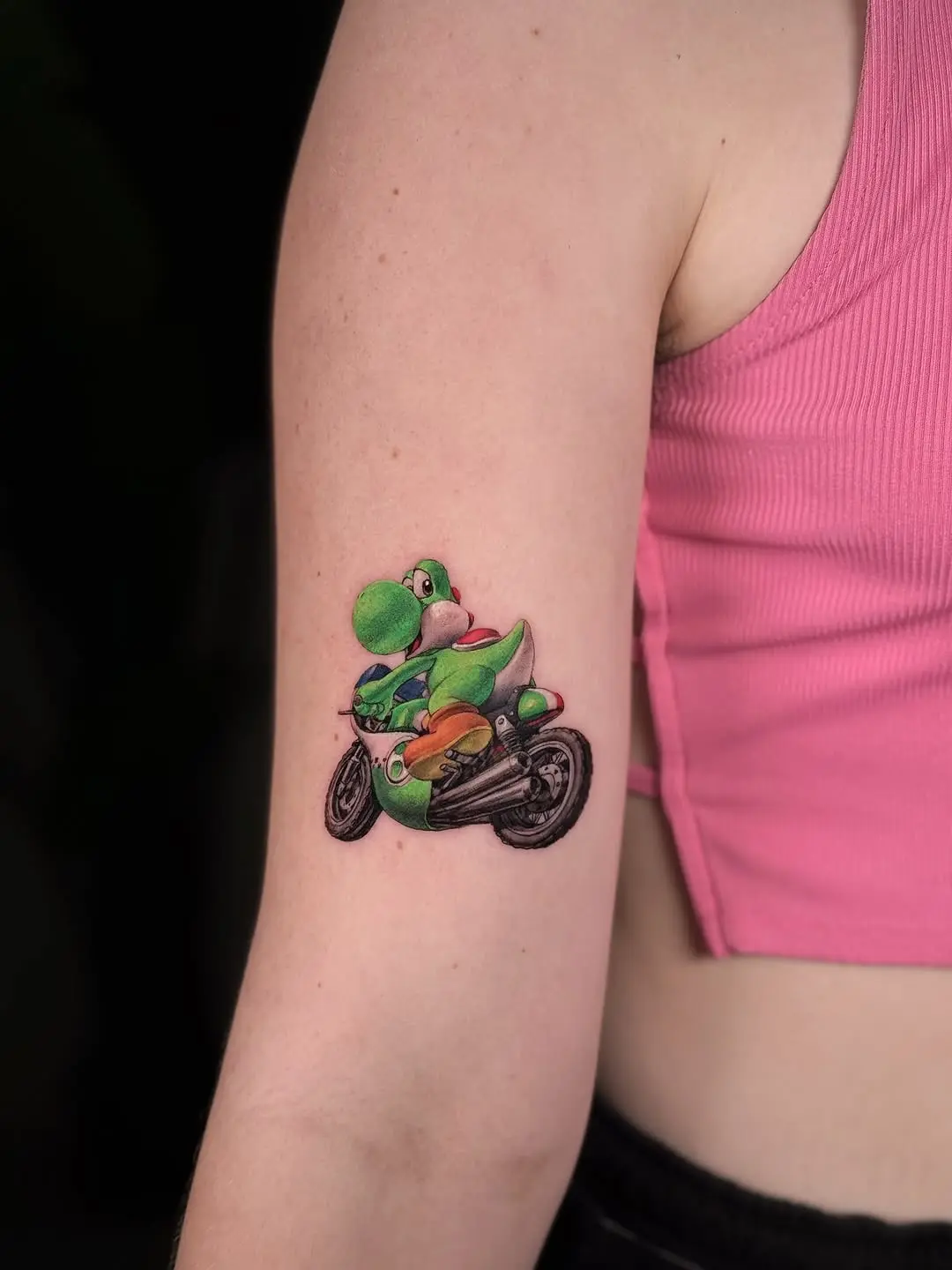 Vibrant Yoshi Tattoo on a Motorcycle