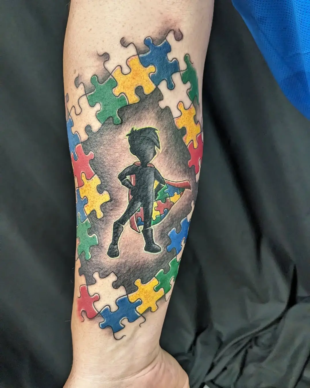 Powerful autism representation through tattoo art