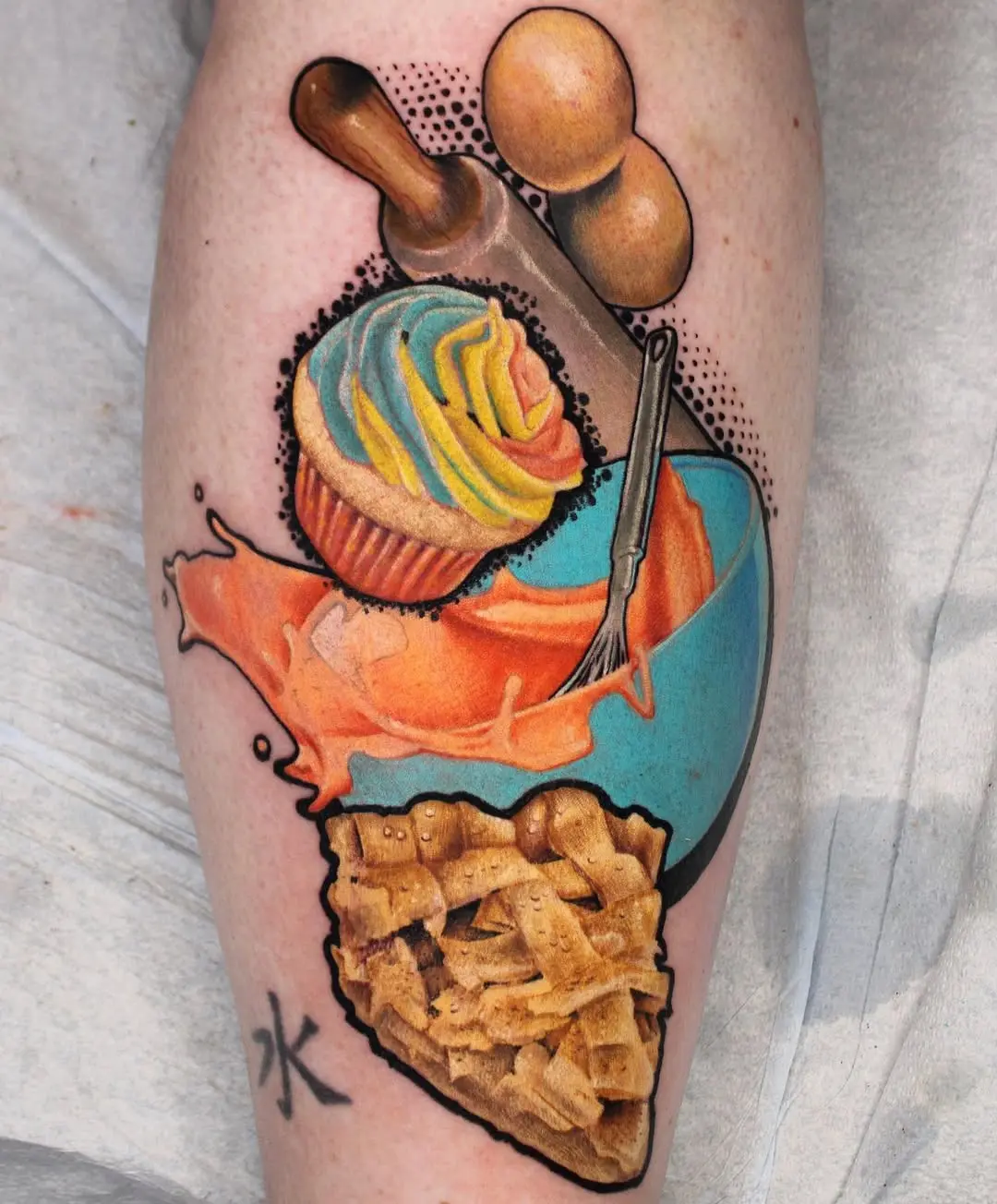 Vibrant baking tattoo showcasing culinary delights