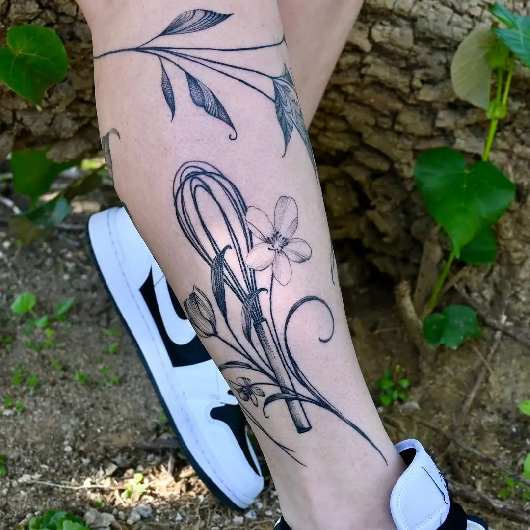 Elegant baking-themed floral tattoo design