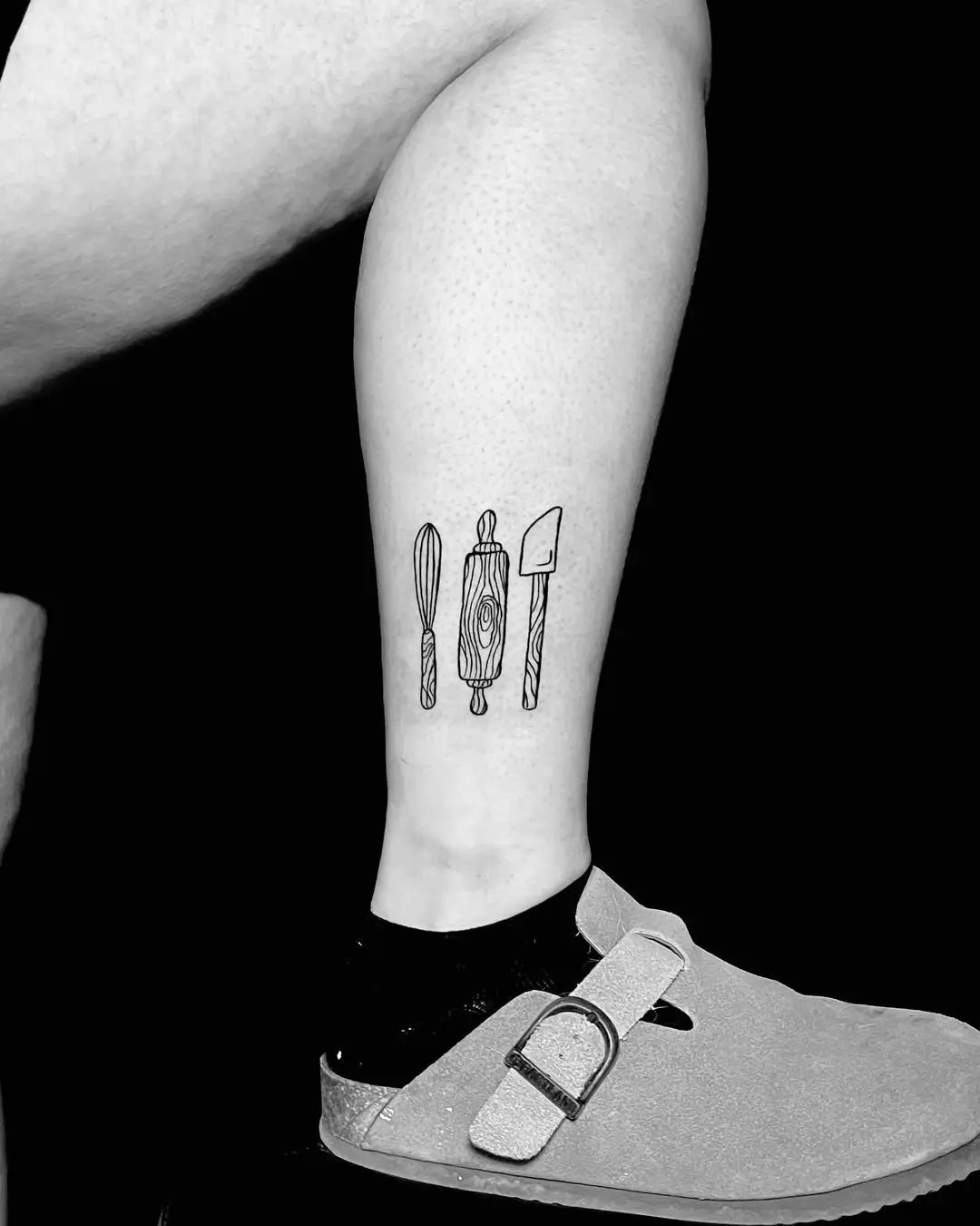 Stylish tattoo featuring essential baking tools