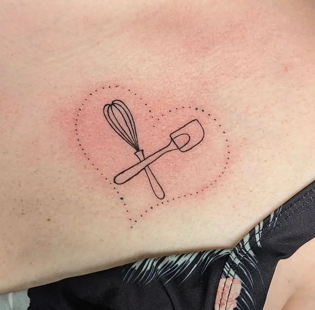 Charming heart-shaped baking tool tattoo design