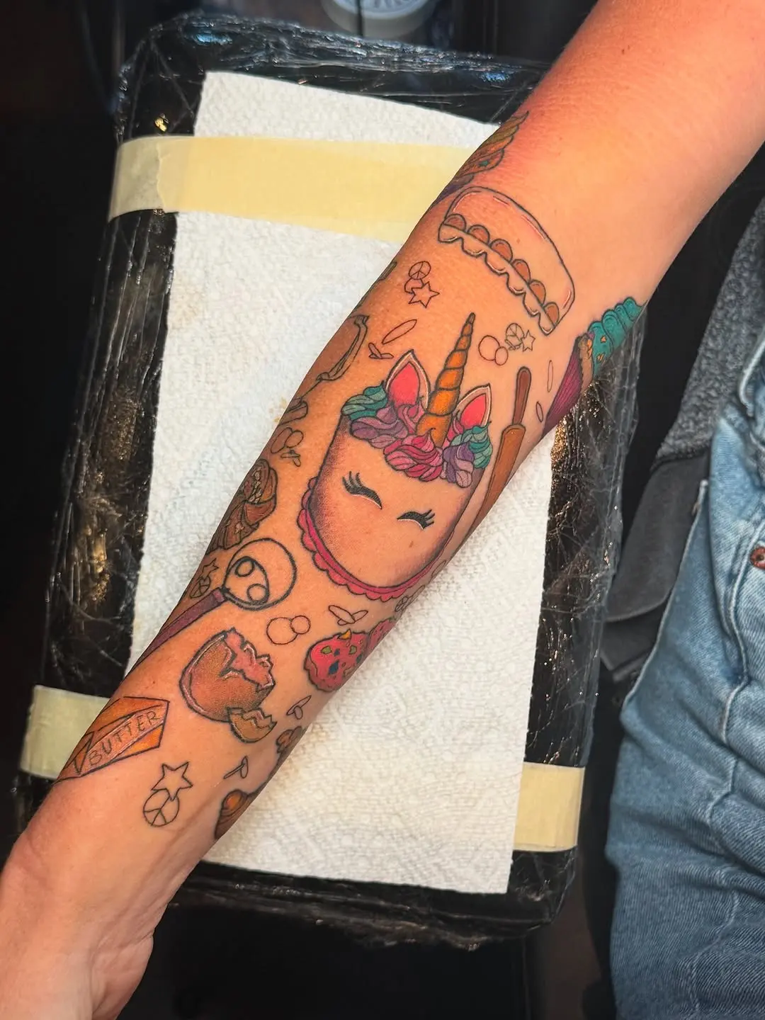 Whimsical Baking-Themed Unicorn Tattoo