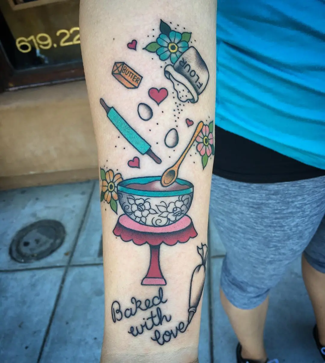 Whimsical baking-themed tattoo with vibrant details