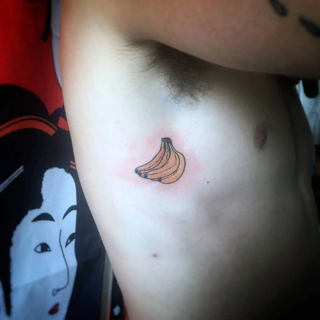 Whimsical Banana Tattoo on Ribcage