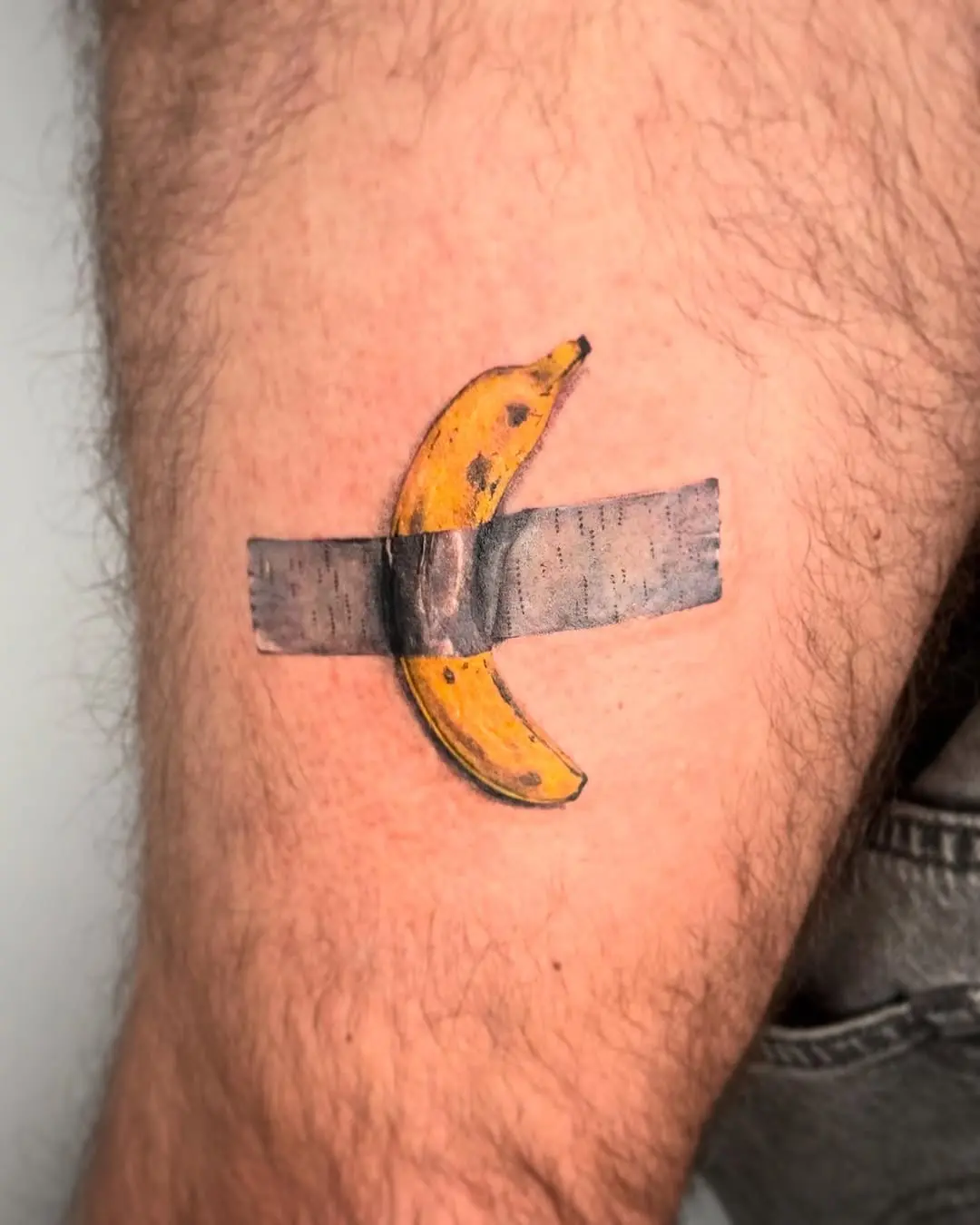 Whimsical banana tattoo with a unique twist