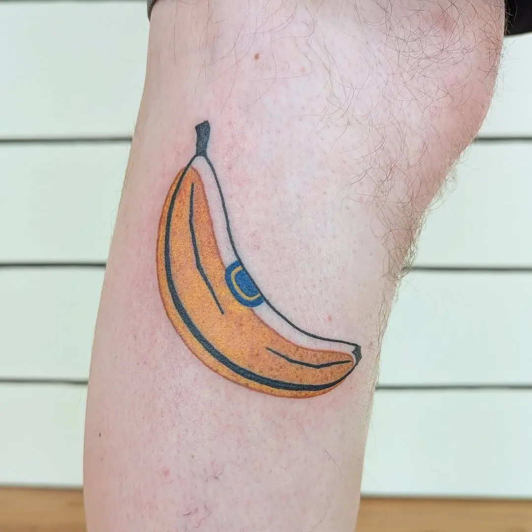 Vibrant banana tattoo showcasing playful artistry