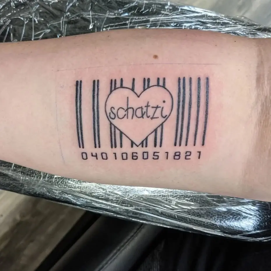 Unique barcode tattoo with heart and text