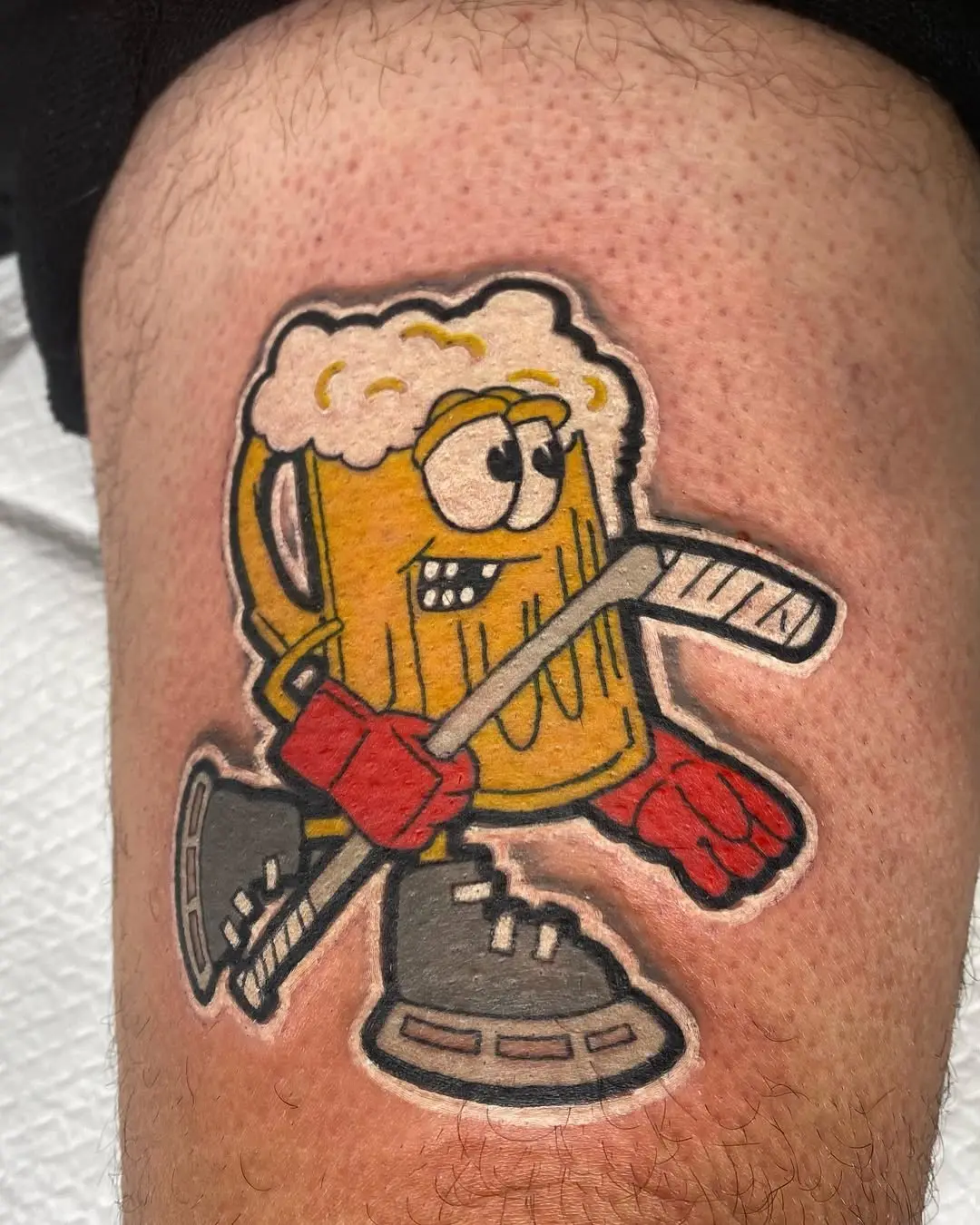 Playful beer character with hockey vibes