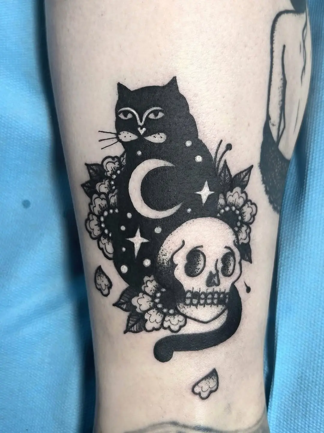 Mystical black cat tattoo design with skull