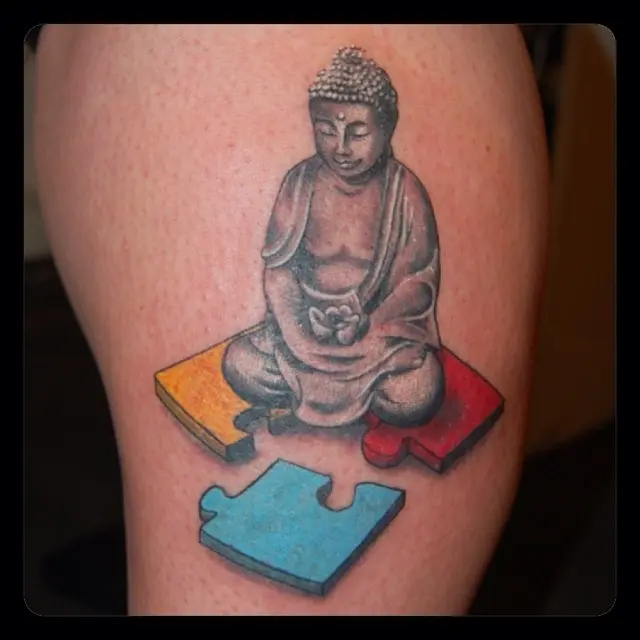 Buddha Tattoo Symbolizing Peace and Autism Awareness